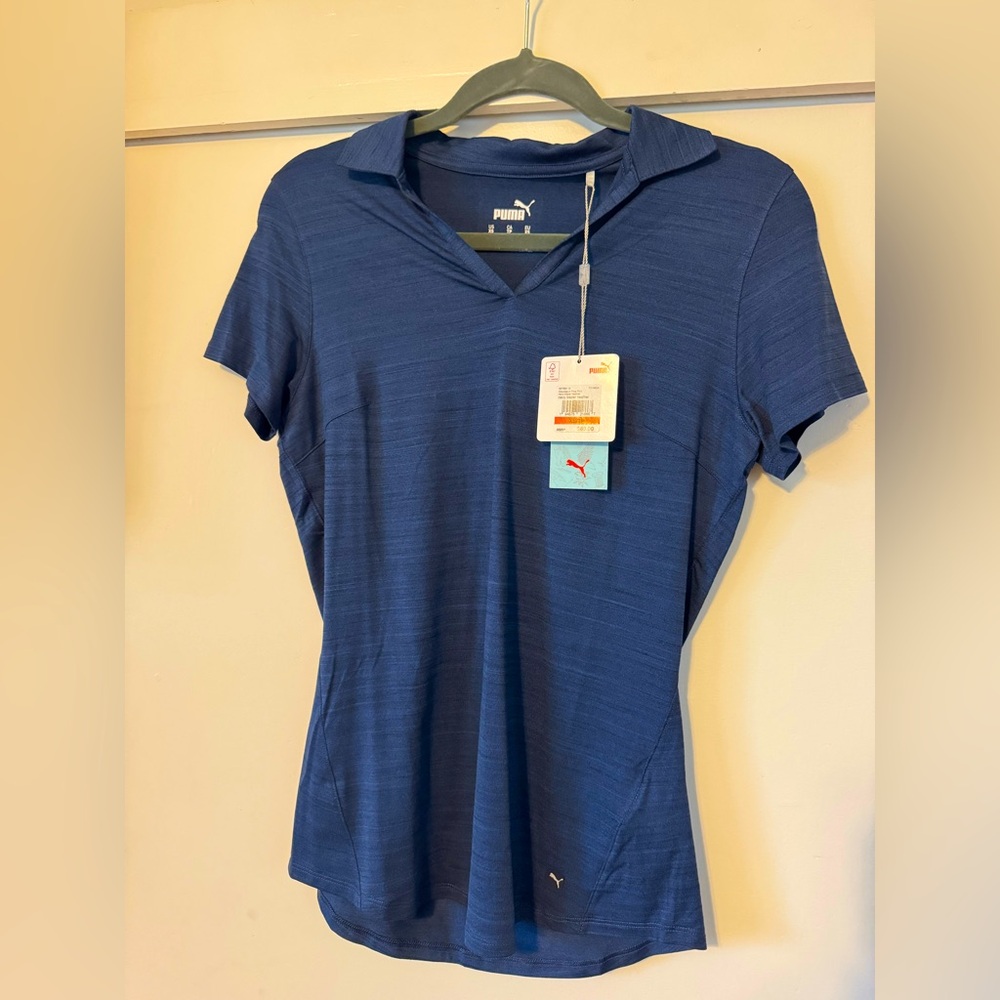 Puma Golf women’s collared shirt, navy blue  XS brand new with tags.
